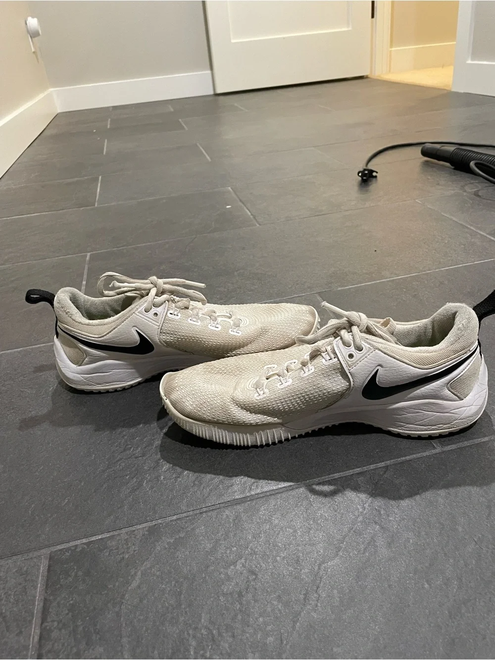Nike White Trainers with Black Swoosh